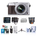 16.8MP Silver Digital Camera with Camera Case, 64GB SDHC Card, Spare Battery, Aluminum Table R6439